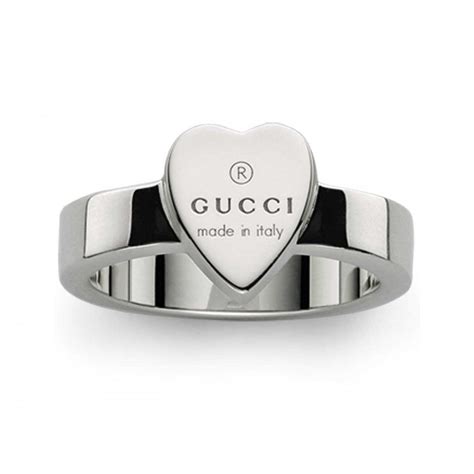 gold heart ring with gucci trademark|gucci trademark ring in gold.